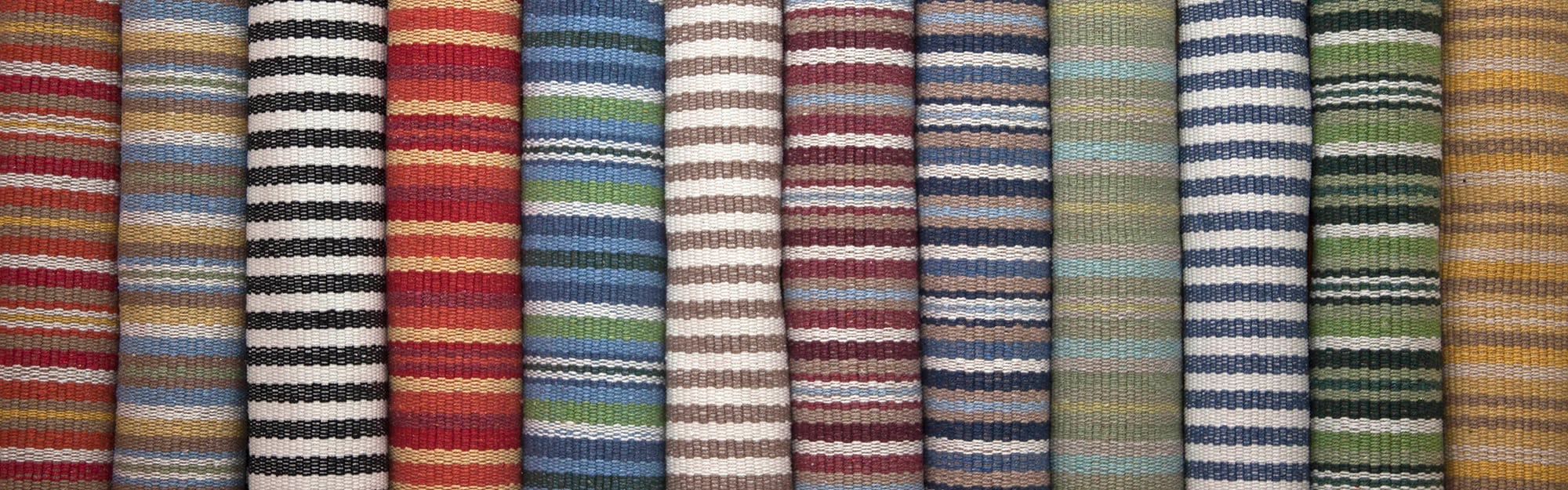 Rolls of striped Eco Cotton rugs
