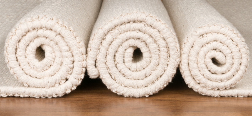 Rolls of our Loom-Hooked organic cotton rugs